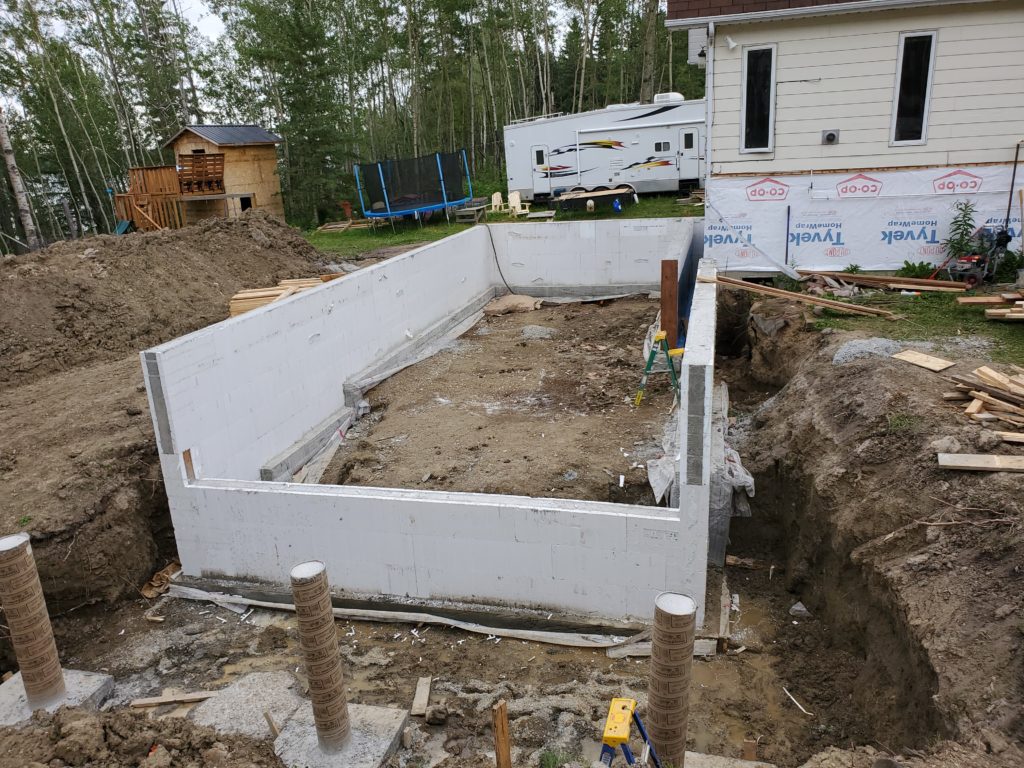 "An Advantage ICF frost wall, showcasing the strength and efficiency of Insulated Concrete Form technology in a walk-out basement addition."