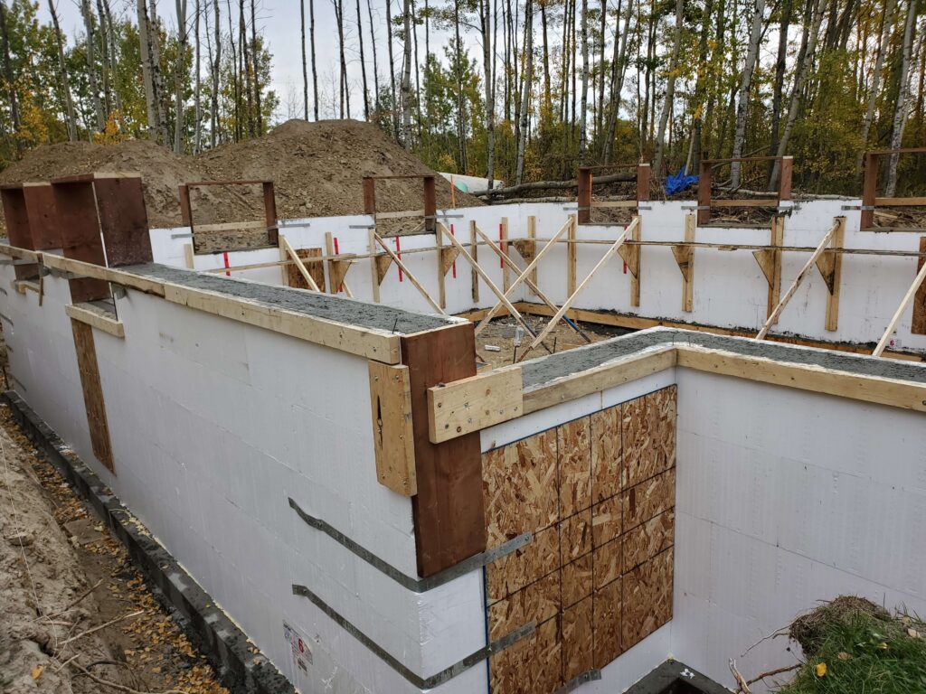 Immaculate 4-foot Logix ICF frost wall showcasing expertly finished ICF construction. The precision and craftsmanship of the completed work highlight the durability and energy efficiency inherent in Logix ICF technology.