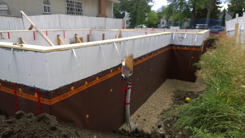 Delta membrane applied to the exterior of an Advantage ICF foundation, enhancing protection for a new infill duplex in Edmonton.