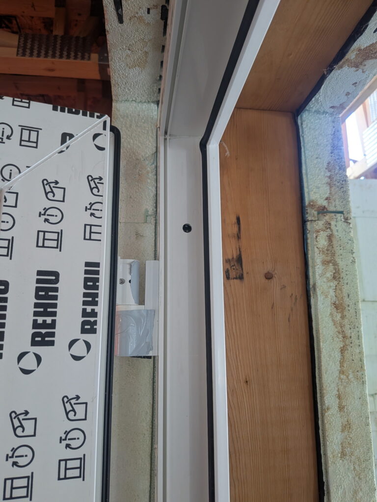 Interior view of an embedded insulated wood buck ready for door installation in an Edmonton ICF house.